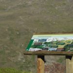 Cartel diseñado en el marco de la acción E12 e instalado en la vertiente norte de Sierra Nevada.